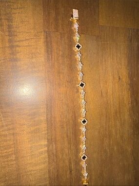 Elegant Gold-Tone Women's Bracelet with Black Accent Stones